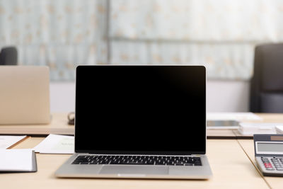 Low angle view of laptop on table