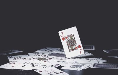 Information sign on table against black background