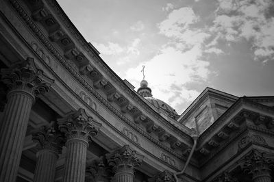 Low angle view of temple against cloudy sky