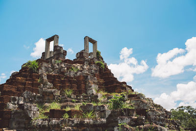 Low angle view of old building against sky