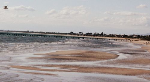 Scenic view of beach against sky