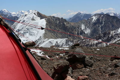 Aerial view of snowcapped mountains against sky