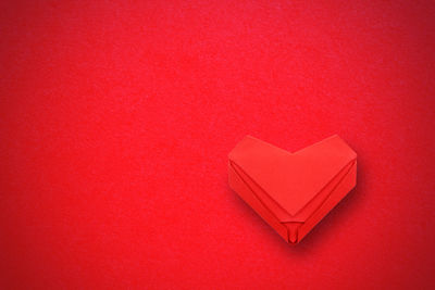 Close-up of heart shape on red paper