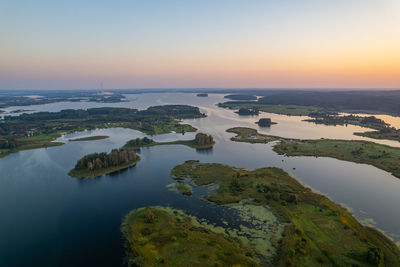 Aerial summer morning sunrise view in sunny elektrenai lake, lithuania