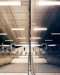 High angle view of man moving down on steps