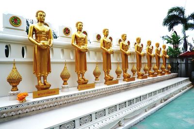 View of buddha statue in row