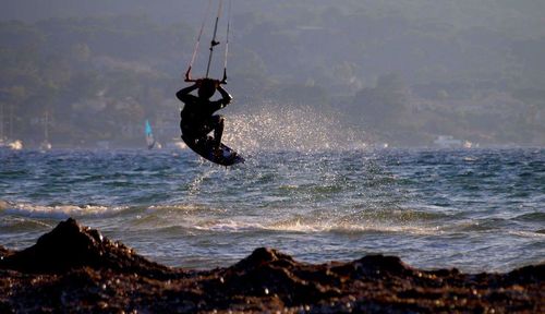 Man surfing in sea 