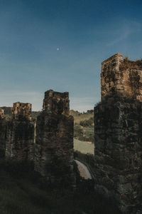 Old buildings against clear sky