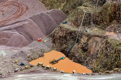 High angle view of rock formation in sea