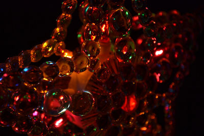 Low angle view of illuminated christmas lights