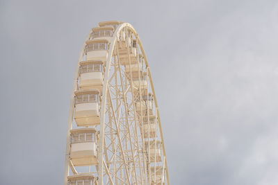 Low angle view of skyscraper against sky