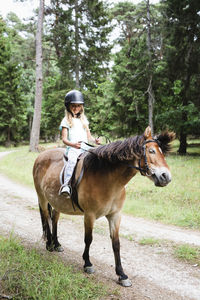 Girl riding horse