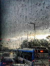 Full frame shot of wet glass window in rainy season