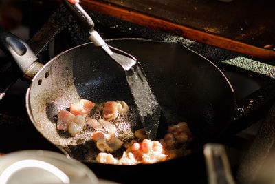 High angle view of meat in cooking pan