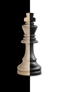 Close-up of chess board against black background