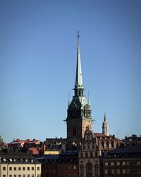 Low angle view of church against blue sky