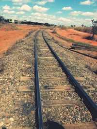 Railroad track against sky