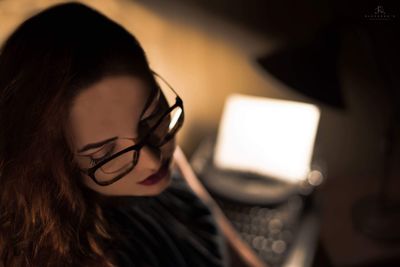 Close-up of young woman with eyeglasses