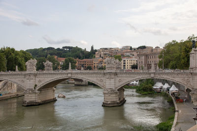 Arch bridge over river