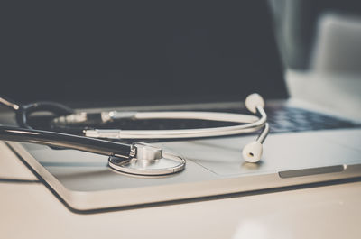 Close-up of stethoscope on table