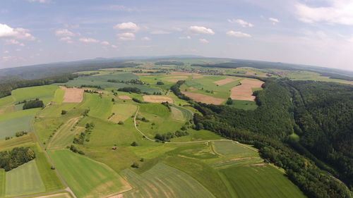 Aerial view of agricultural landscape against sky