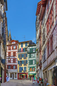 Street with historical houses in bayonne city center, france