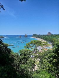 Scenic view of calm sea against clear sky