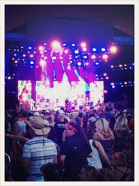 People enjoying at concert