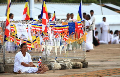 Full length of man sitting in temple