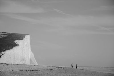 Silhouette of people on beach