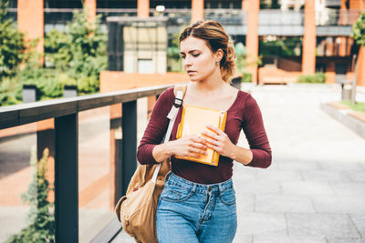 Young woman using mobile phone