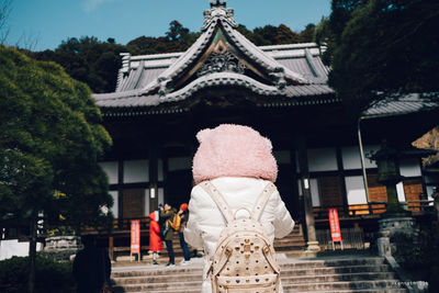 Low angle view of statue against building