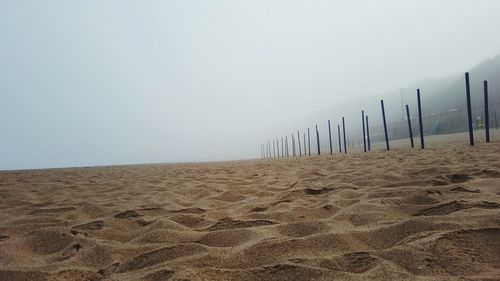 Scenic view of beach against clear sky