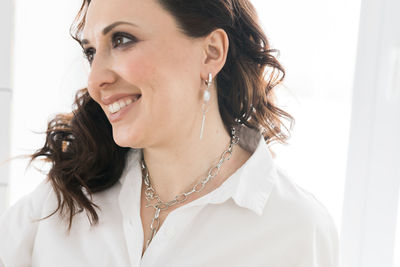 Close-up of young woman looking away