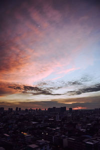 High angle view of buildings against sky during sunset