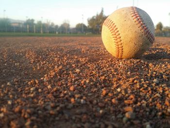 Close-up of baseball on field