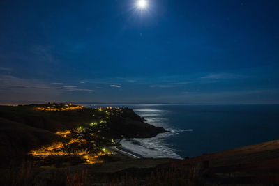 Scenic view of sea at night