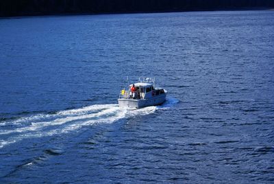 High angle view of boat sailing on sea