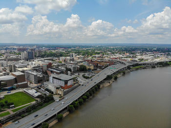 High angle view of river amidst buildings in city