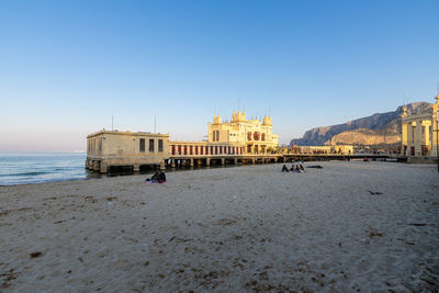 Beach view in sunset alle terazze building at mondello in palermo, sicily, southern italy.