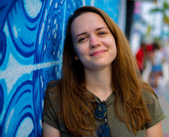 Portrait of young woman looking away