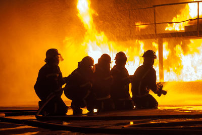 Firefighters extinguishing fire