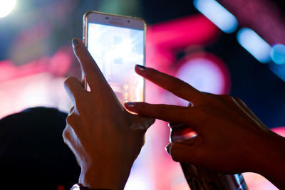 Close-up of woman hand photographing with smart phone