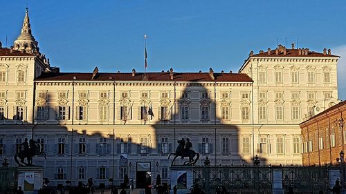 Statue of historic building against sky