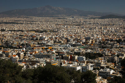 High angle view of townscape against mountains