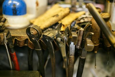 Close-up of tools on workbench