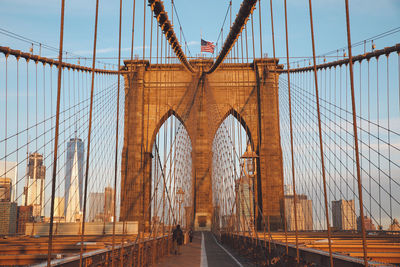 Brooklyn bridge and cityscape against sky