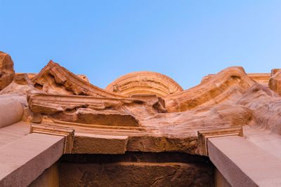 Rock formations against blue sky