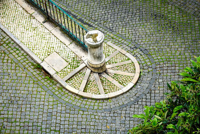 High angle view of cobbled path and road