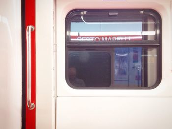 Train seen through window